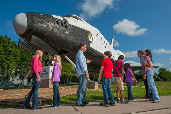 Space Center Houston's full-size space shuttle mockup went on display outside the NASA Johnson Space Center visitor center in 2012. In 2015, it will be displayed atop NASA's historic Shuttle Carrier Aircraft.