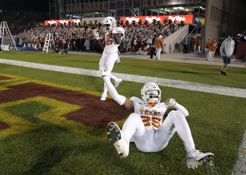 Texas defensive back Jelani McDonald (25) celebrates after his team's win over Iowa State in an NCAA college football game, Saturday, Nov. 18, 2023, in Ames, Iowa. (AP Photo/Matthew Putney)