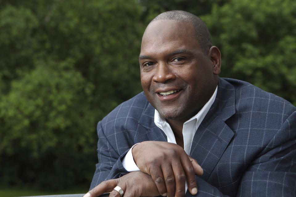 FILE - In this June 29, 2013, file photo, former Montreal Expos player Tim Raines poses for a photograph prior to the induction ceremony for the Canadian Baseball Hall of Fame in St. Mary's, Ontario. Raines and Jeff Bagwell are likely to be voted into baseball's Hall of Fame on Wednesday, Jan. 18, 2017, when Trevor Hoffman and Ivan Rodriguez also could gain the honor. (Dave Chidley/The Canadian Press via AP, File)