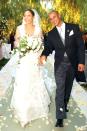 <p>J. Lo's been hitched three times, but her best dress so far appeared at her nuptials to former backup dancer Cris Judd. The off-white silk and Chantilly lace gown with a plunging front and back was designed by Valentino.</p><p><strong>RELATED</strong>: <a href="https://www.goodhousekeeping.com/life/entertainment/a34861302/jlo-beauty-secrets-skin-line/" rel="nofollow noopener" target="_blank" data-ylk="slk:JLo Wants You To Stop Telling Her She Looks Good for 50;elm:context_link;itc:0;sec:content-canvas" class="link ">JLo Wants You To Stop Telling Her She Looks Good for 50</a></p>