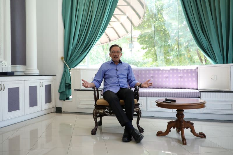 Malaysia's politician Anwar Ibrahim speaks during an interview with Reuters in Petaling Jaya