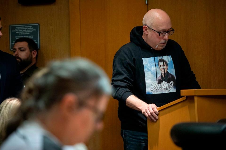 PHOTO: Jennifer Crumbley listens as James Shilling, father of Justin Shilling, one of the four Oxford High School students who were shot and killed by mass school shooter Ethan Crumbley, reads a victim impact statement, April 9, 2024, Pontiac, Michigan. (Bill Pugliano/Getty Images)