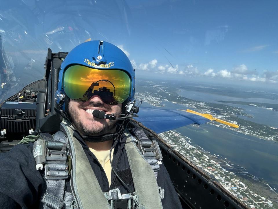 Austin Courson, a J.M. Tate High School teacher, took the flight of his life Thursday during a ride with Blue Angel Lt. Connor O’Donnell