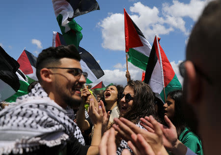 Members of Israel's Arab minority take part in a rally marking the "Nakba" or "Catastrophe", when Palestinians lament the loss of their homeland in the 1948-49 war, that caused the creation of Israel, near the abandoned village of Khubbayza, northern Israel May 9, 2019. REUTERS/Ammar Awad