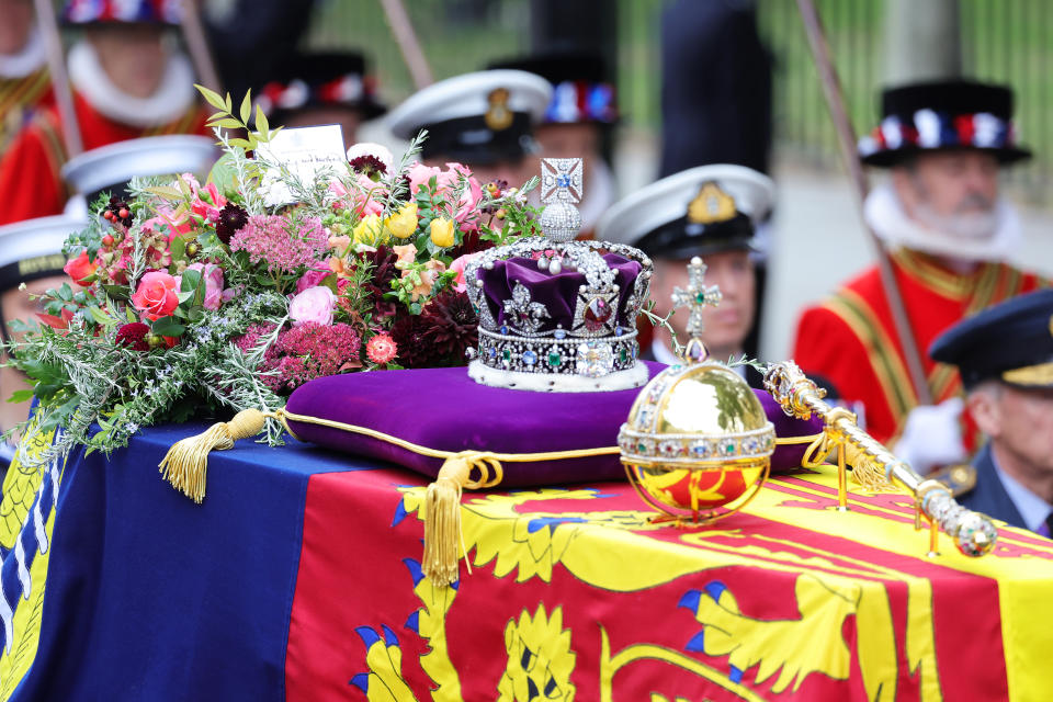 <p>LONDON, ENGLAND - SEPTEMBER 19: The coffin of Queen Elizabeth II with the Imperial State Crown resting on top is carried into Westminster Abbey on September 19, 2022 in London, England. Elizabeth Alexandra Mary Windsor was born in Bruton Street, Mayfair, London on 21 April 1926. She married Prince Philip in 1947 and ascended the throne of the United Kingdom and Commonwealth on 6 February 1952 after the death of her Father, King George VI. Queen Elizabeth II died at Balmoral Castle in Scotland on September 8, 2022, and is succeeded by her eldest son, King Charles III. (Photo by Chris Jackson/Getty Images)</p> 