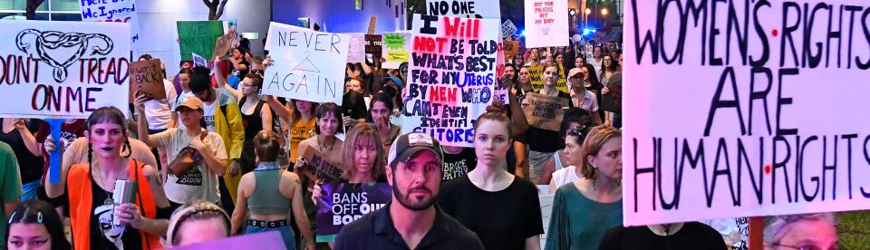 'We Dissent' protest in downtown Sarasota had some 200 demonstrators that gathered at Selby Five Points Park and marched to the Judge Lynn N. Silvertooth Judicial Center, while braving rain and lightning.