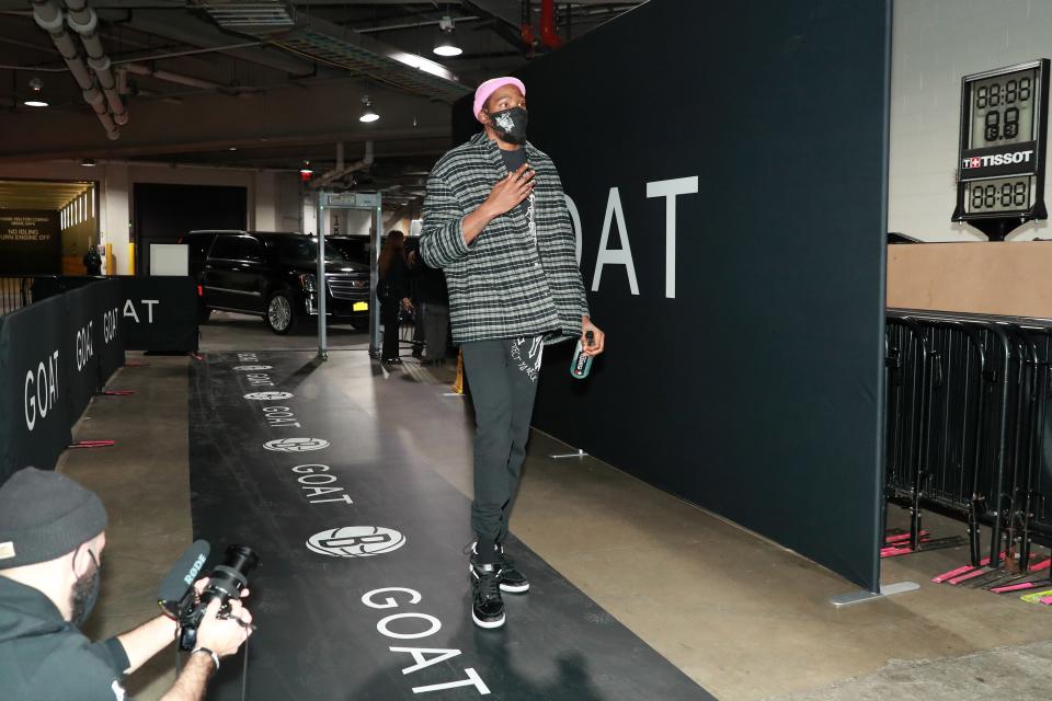 Kevin Durant of the Nets arrives for a game against the Golden State Warriors in Brooklyn, December 22, 2020.