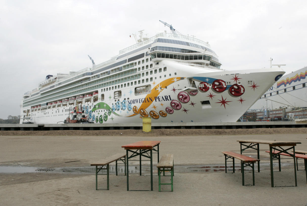 Newly build cruiser 'Norwegian Pearl' is docked in the port of the Meyer shipyard in Papenburg, northern Germany, Monday, Nov. 6, 2006. On Saturday a power line was deactivated for a safety passage of the 'Norwegian Pearl' through the river Ems. The shutdown probably caused a blackout in several European countries. The ship remained in the port. (AP Photo/Joerg Sarbach)