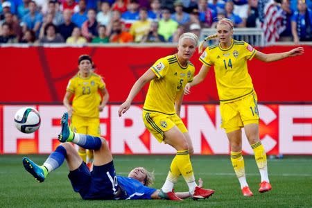 Jun 12, 2015; Winnipeg, Manitoba, CAN; United States forward Abby Wambach (20) attempts to control the ball while on the ground during the second half against Sweden in a Group D soccer match in the 2015 FIFA women's World Cup at Winnipeg Stadium. The game ended in a draw 0-0. Mandatory Credit: Michael Chow-USA TODAY Sports
