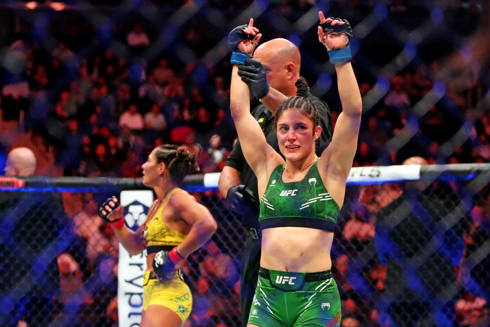 Nov 11, 2023; New York, NY, USA; Loopy Godinez (blue gloves) celebrates beating Tabatha Ricci (red gloves) during UFC 295 at Madison Square Garden. Mandatory Credit: Wendell Cruz-USA TODAY Sports