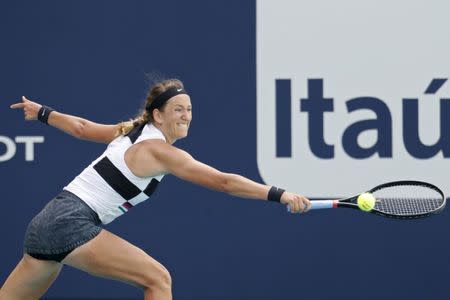 Mar 20, 2019; Miami Gardens, FL, USA; Victoria Azarenka of Belarus reaches for a backhand against Dominika Cibulkova of Slovakia (not pictured) in the first round of the Miami Open at Miami Open Tennis Complex. Geoff Burke