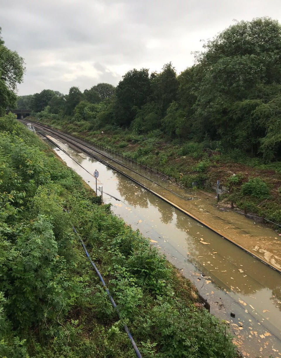 Network Rail posted an image of flooding at Mitcham Junction (Picture: PA)