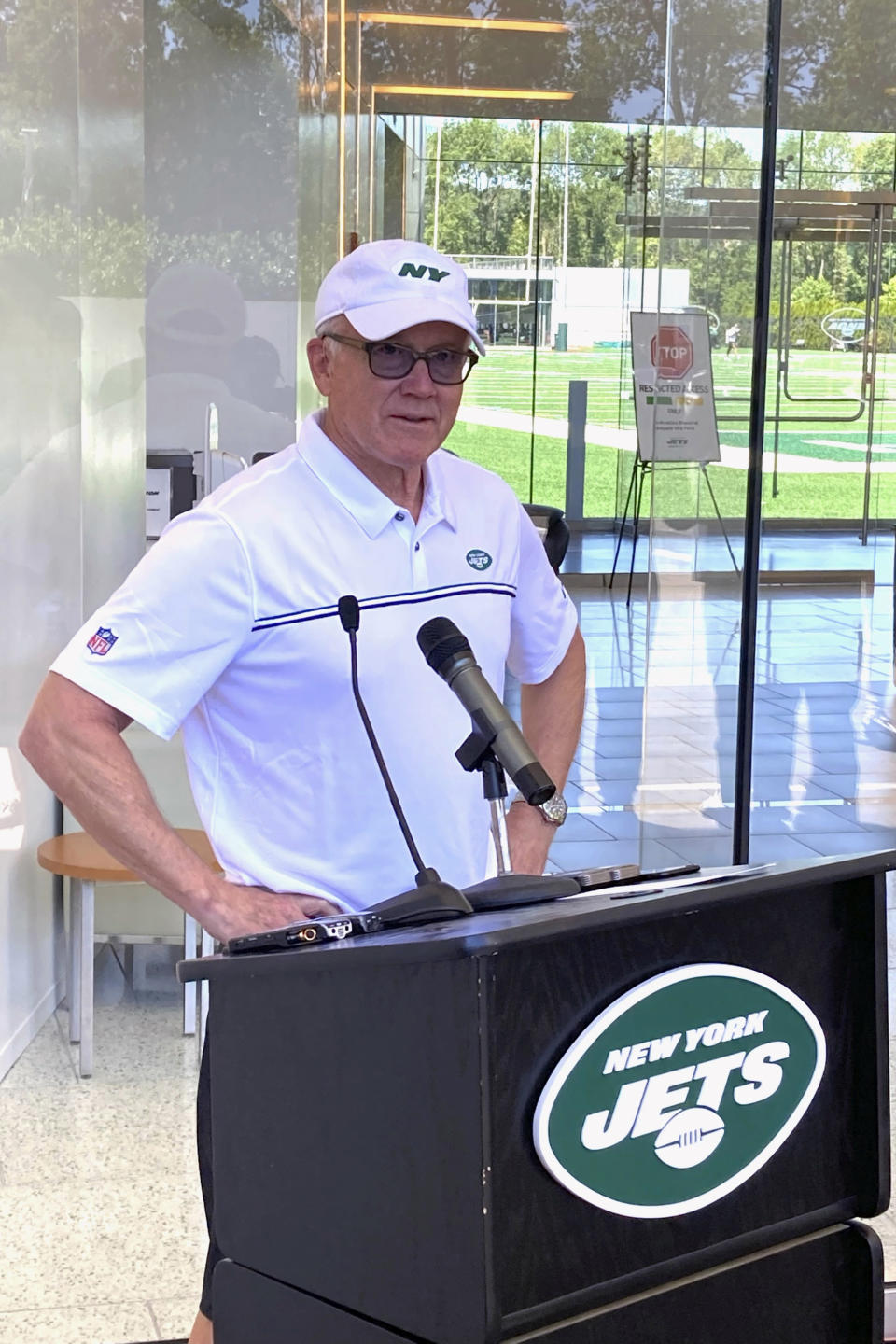 New York Jets owner and chairman Woody Johnson speaks to reporters at the team’s NFL football facility in Florham Park, N.J, Wednesday, June 16, 2021. (AP Photo/Dennis Waszak Jr.)