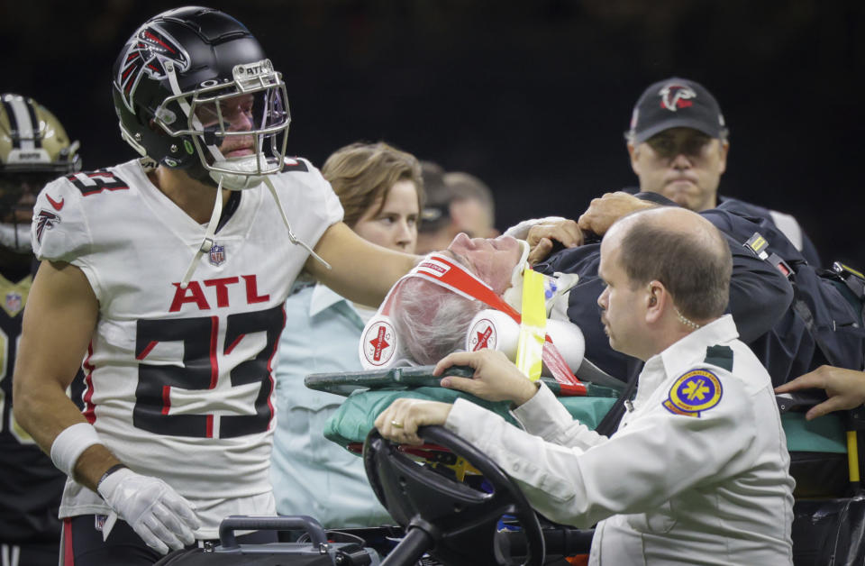 Atlanta Falcons defensive coordinator Dean Pees is carted off the field shortly before Sunday's game against the New Orleans Saints in New Orleans, Sunday, Dec.18, 2022. (Brett Duke/The Times-Picayune/The New Orleans Advocate via AP)