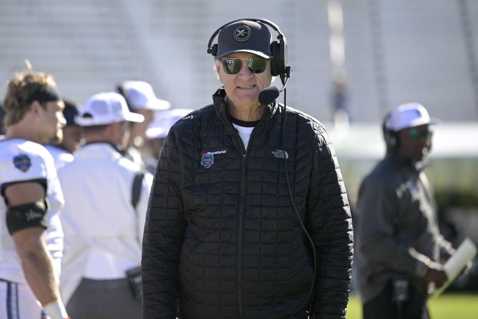 Team Kai head coach Brian Billick, center, walks along the sideline during the second half of the Hula Bowl NCAA college football game against Team Aina, Saturday, Jan. 14, 2023, in Orlando, Fla. | Phelan M. Ebenhack, Associated Press