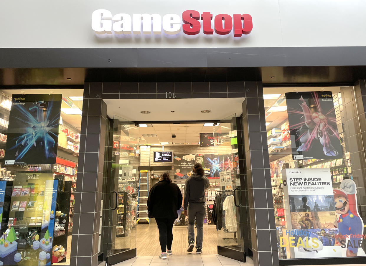 SAN RAFAEL, CALIFORNIA - DECEMBER 08: Customers enter a GameStop store on December 08, 2021 in San Rafael, California. Video game retailer GameStop will report third quarter earnings today after the closing bell. (Photo by Justin Sullivan/Getty Images)