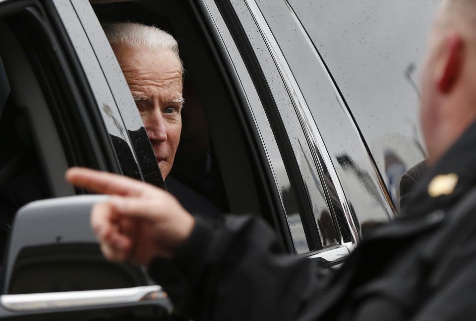 Former vice president Joe Biden looks out the car window as he leaves after speaking at a rally in support of striking Stop & Shop workers in Boston, Thursday, April 18, 2019. (AP Photo/Michael Dwyer)