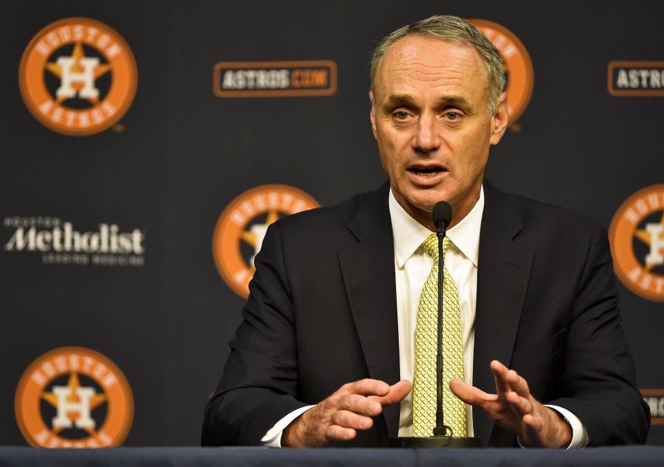 MLB Commissioner Rob Manfred speaks to the media before a baseball game between the Houston Astros and the Detroit Tigers, Tuesday, May 23, 2017, in Houston. Manfred is in Houston to participate in the B.A.T. ceremony honoring former MLB player Bob Watson with its lifetime achievement award. (AP Photo/Eric Christian Smith)