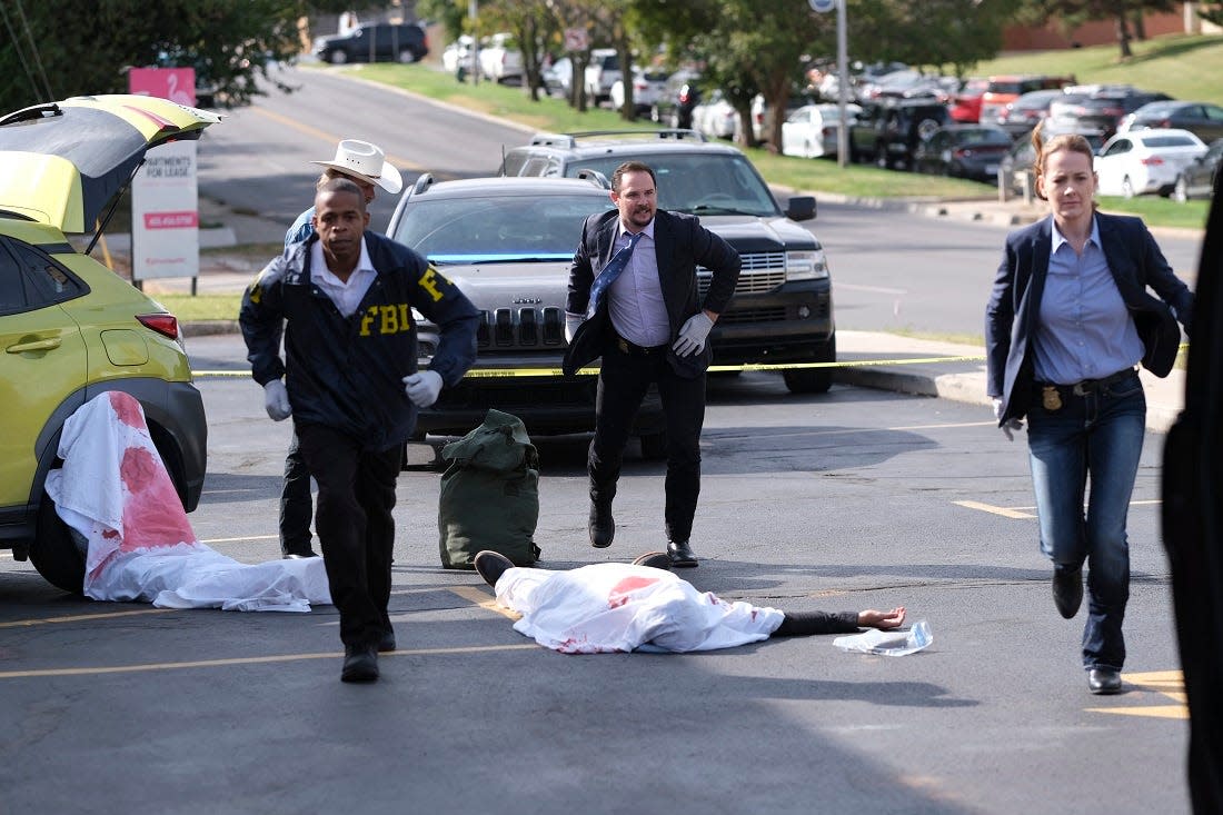 From left, actors Josiah Overstreet, Ryan Merriman and Karrie Cox act out a scene on the set of the Oklahoma film "Out of Exile" at the Flamingo Apartments on NW 23 St. Thursday, October 15, 2020. [Doug Hoke/The Oklahoman]