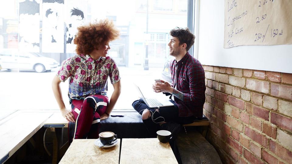 Man and woman at a cafe.