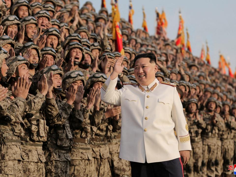 North Korean leader Kim Jong Un meets troops who have taken part in the military parade to mark the 90th anniversary of the founding of the Korean People's Revolutionary Army