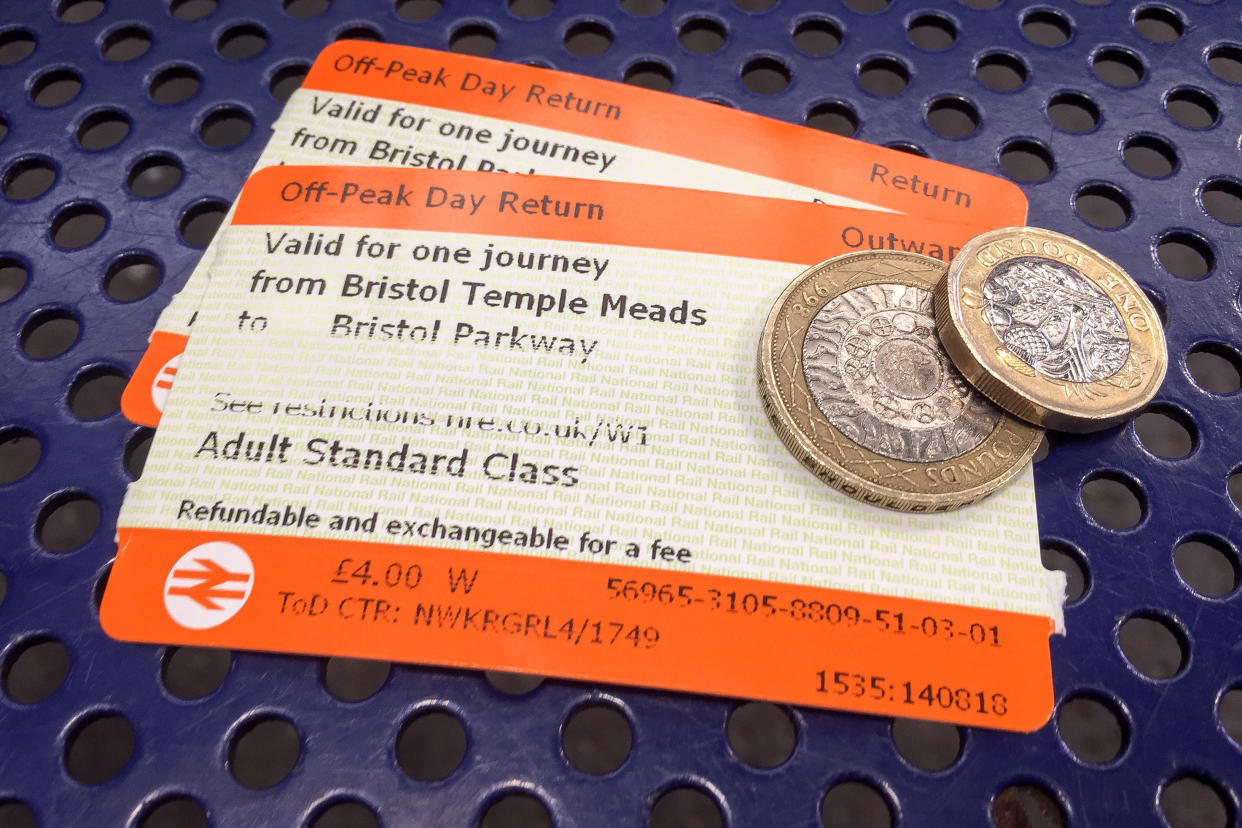File photo dated 14/08/18 of off-peak day return rail tickets and money. Train companies have admitted overcharging thousands of passengers caught fare dodging. PRESS ASSOCIATION Photo. Issue date: Wednesday August 21, 2019. Industry body the Rail Delivery Group (RDG) told the PA news agency that eight train companies punished ticketless travellers too harshly by not implementing a rule change made in April last year. See PA story RAIL Overcharged. Photo credit should read: Ben Birchall/PA Wire 