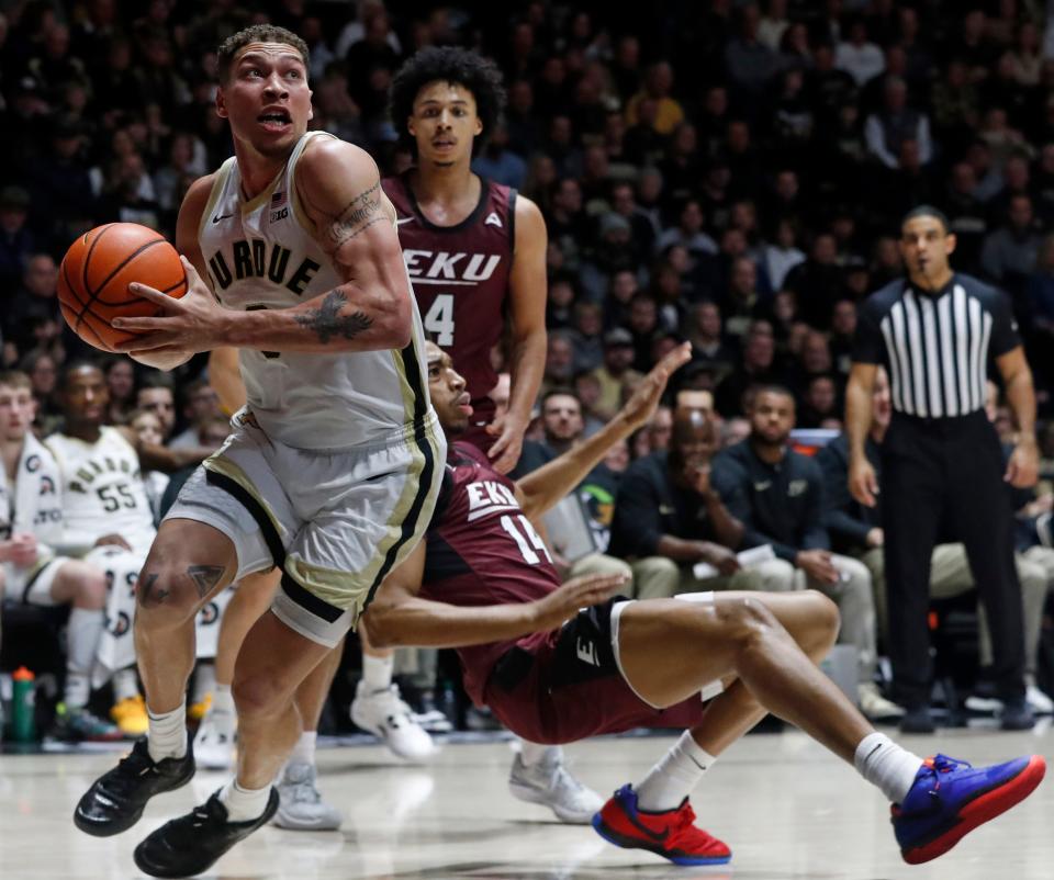 Purdue Boilermakers forward Mason Gillis (0) drives to the basket during the NCAA men’s basketball game against the Eastern Kentucky Colonels, Friday, Dec. 29, 2023, at Mackey Arena in West Lafayette, Ind. Purdue Boilermakers won 80-53.