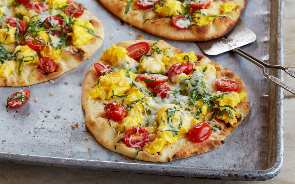 <p>American Egg Board</p><p>Pizza can and should be the answer to a delicious, healthy breakfast! Try this recipe to get your mornings off to a scrumptious start.</p><p><strong>Get the recipe: <a href="/841457/communitytable/mini-breakfast-egg-tomato-spinach-flatbread-pizzas/" data-ylk="slk:Mini Flatbread Breakfast Pizzas;elm:context_link;itc:0;sec:content-canvas" class="link rapid-noclick-resp">Mini Flatbread Breakfast Pizzas</a></strong></p>