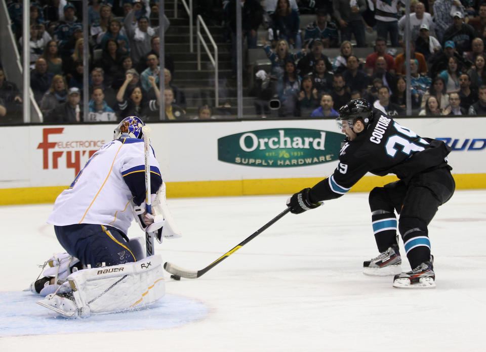 SAN JOSE, CA - APRIL 19: Brian Elliott #1 of the St. Louis Blues stops Logan Couture #39 of the San Jose Sharks from scoring in the first period of Game Four of the Western Conference Quarterfinals during the 2012 NHL Stanley Cup Playoffs at HP Pavilion on April 19, 2012 in San Jose, California. (Photo by Ezra Shaw/Getty Images)