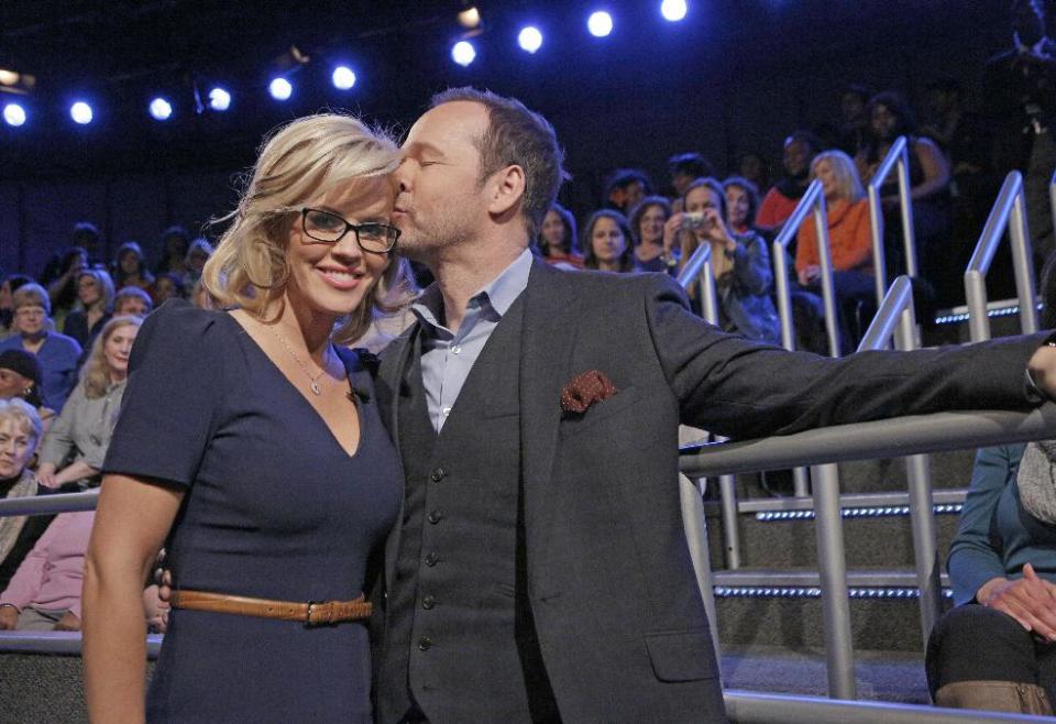 This image released by ABC shows co-host Jenny McCarthy with her fiance Donnie Wahlberg after she announced her engagement on the daytime series "The View," Wednesday, April 16, 2014 in New York. (AP Photo/ABC, Heidi Gutman)