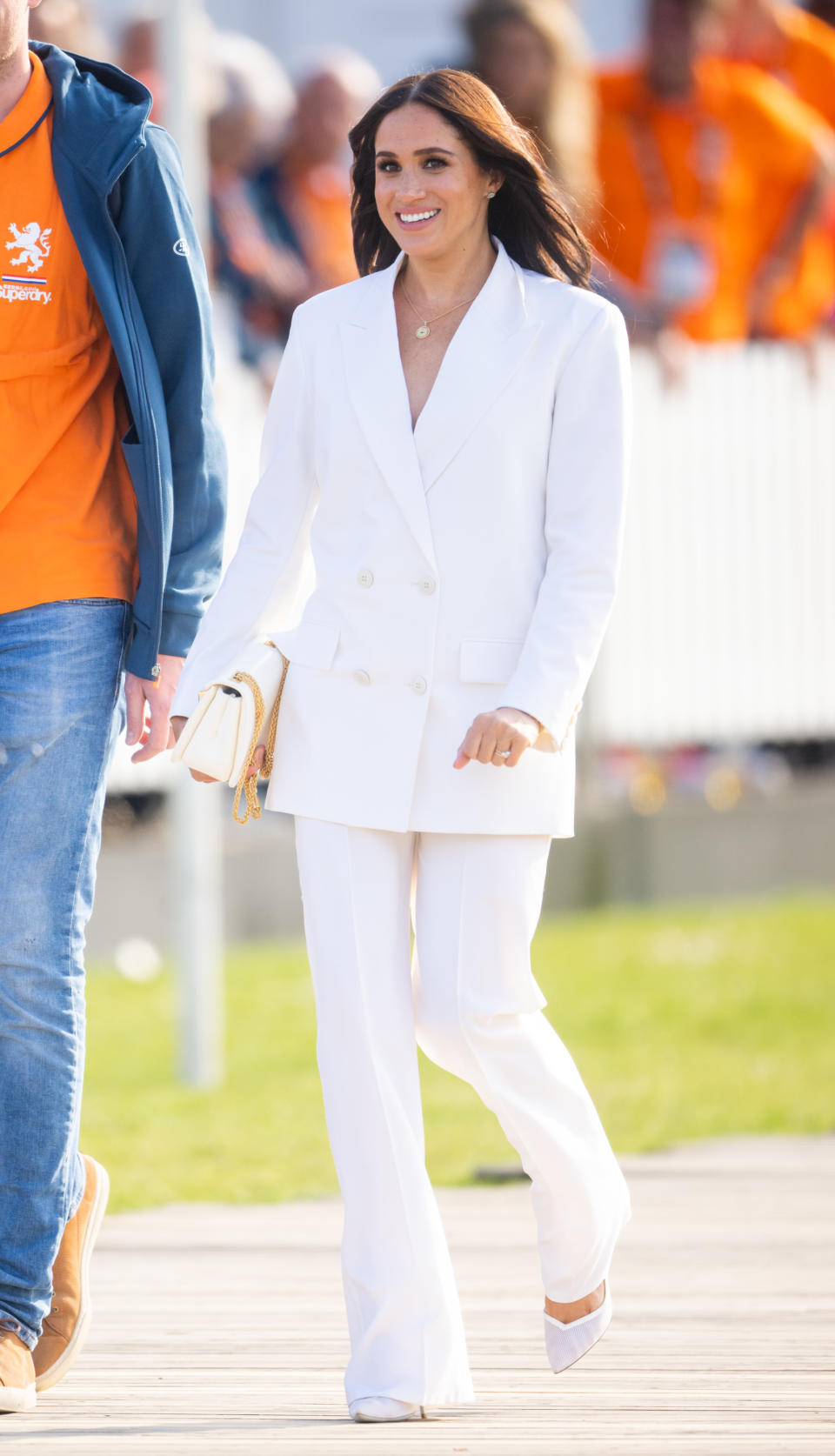 Markle wore a white suit for the first Invictus Games events. (Photo: Samir Hussein/WireImage)