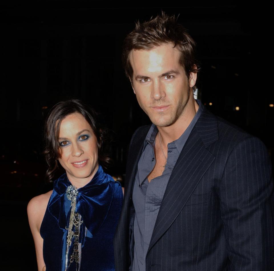 alanis and ryan at a formal event