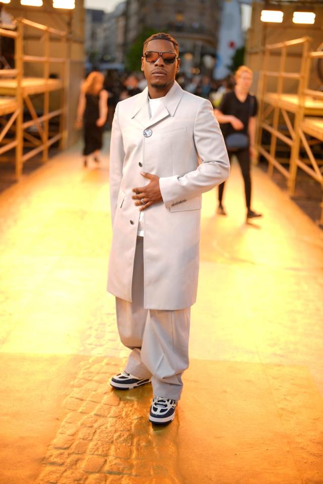 Pharrell Williams' Humanrace Makes Debut at Louis Vuitton Fashion Show –  Billboard