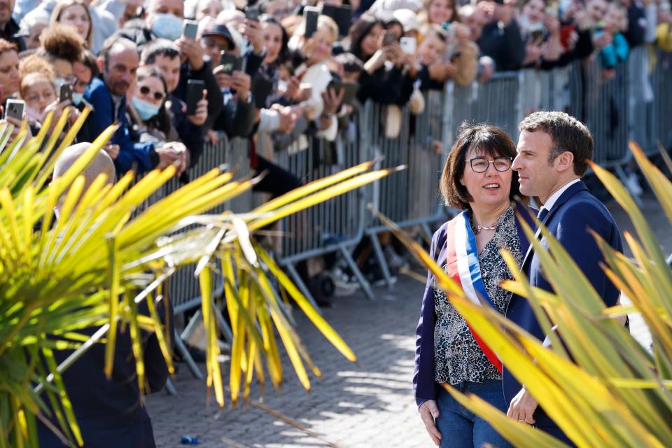 Denain’s mayor Anne-Lise Dufour-Tonini welcomes Emmanuel Macron during a one day visit of Hauts-de-France, at the town hall in Denain (AFP via Getty Images)