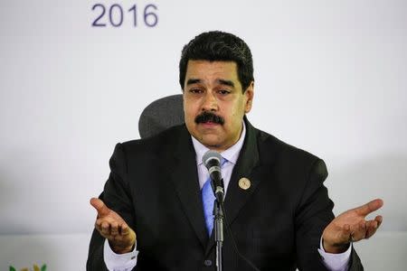 Venezuela's President Nicolas Maduro talks to the media during a news conference after the 17th Non-Aligned Summit in Porlamar, Venezuela September 18, 2016. REUTERS/Marco Bello