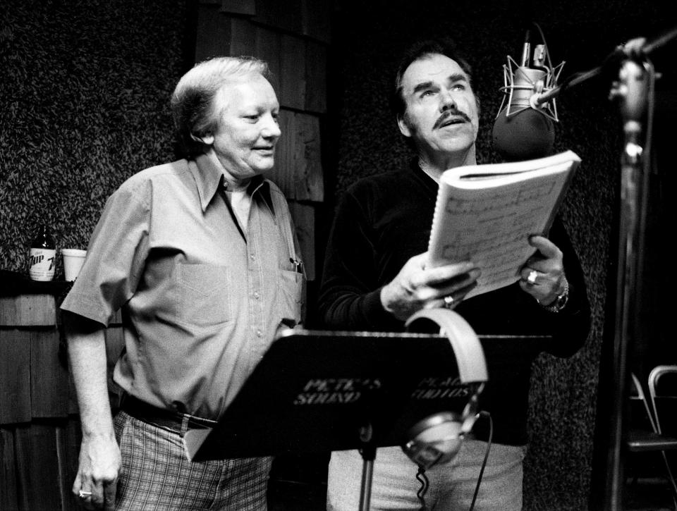 Singer Slim Whitman, right, works with producer Pete Drake in the studio June 9, 1981. With the torrid temperature soaring, Whitman kept his cool by recording a Christmas album. The album will be a two-record set and available simultaneously in stores ands through television ads later this year.