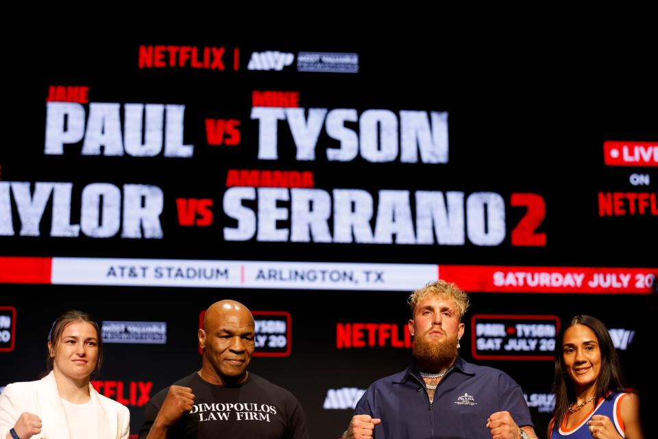 NEW YORK, NEW YORK - MAY 13: (L-R) Katie Taylor, Mike Tyson, Jake Paul, and Amanda Serrano speak onstage at the press conference in promotion for the upcoming Jake Paul vs. Mike Tyson boxing match at The Apollo Theater on May 13, 2024 in New York City. (Photo by Sarah Stier/Getty Images for Netflix)