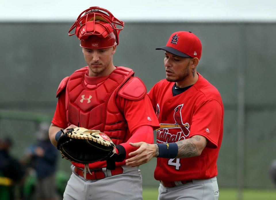 Yadier Molina, right, has signed on as a special assistant for the Cardinals with speculation he’ll someday be the team’s manager. Jeff Roberson/AP
