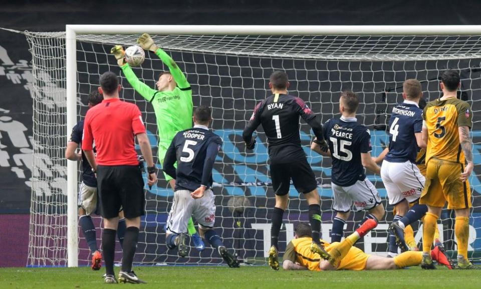 David Martin drops the ball into his own net to gift Brighton a late equaliser and take the game into extra-time.