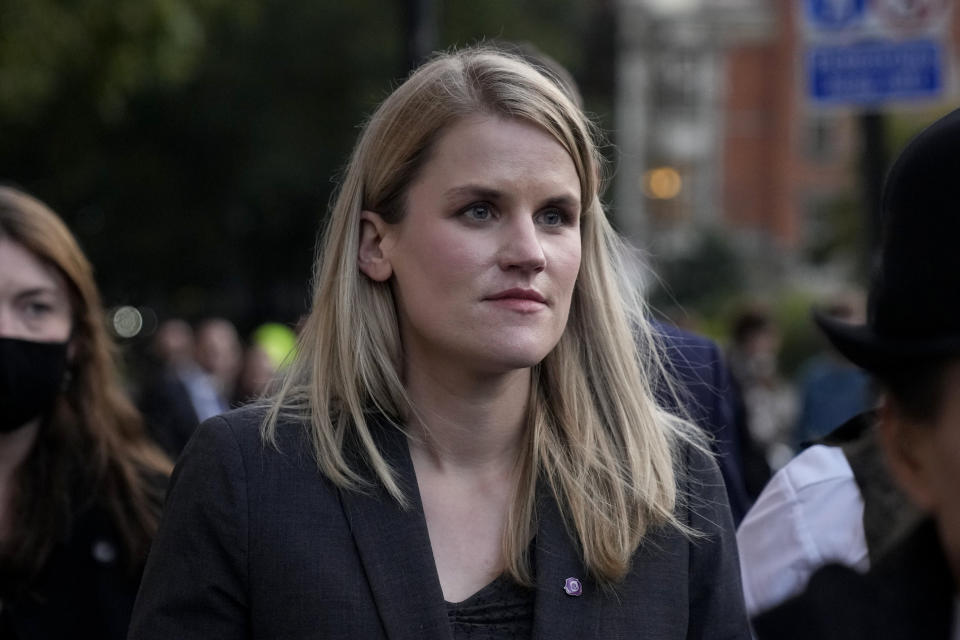 Facebook whistleblower Frances Haugen leaves after giving evidence to the joint committee for the Draft Online Safety Bill, as part of British government plans for social media regulation, at the Houses of Parliament, in London, Monday, Oct. 25, 2021. Facebook whistleblower Frances Haugen told British lawmakers Monday that the social media giant stokes online hate and extremism, fails to protect children from harmful content and lacks any incentive to fix the problems, providing strong momentum for efforts by European governments working on stricter regulation of tech giants. (AP Photo/Matt Dunham)