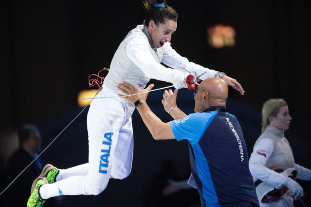 18 June 2019, North Rhine-Westphalia, Duesseldorf: Fencing: European Championship: foil, single, damn, final: Di Francisca (Italy) - Deriglazova (Russia): Elisa Di Francisca (l) jumps into the arms of her coach Andrea Cipressa after winning the final. Photo: Federico Gambarini/dpa (Photo by Federico Gambarini/picture alliance via Getty Images) (Photo: picture alliance via picture alliance via Getty Image)