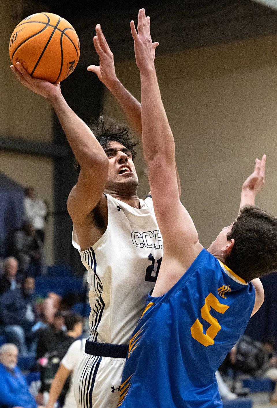 Central Catholic’s Manjot Mann shoots over ripon Christian’s E J Bruno during the Mark Gallo Invitational Basketball Tournament at Central Catholic High School in Modesto, Calif., Saturday, Dec. 9, 2023. Central Catholic won the game 64-32 to place third in the tournament.