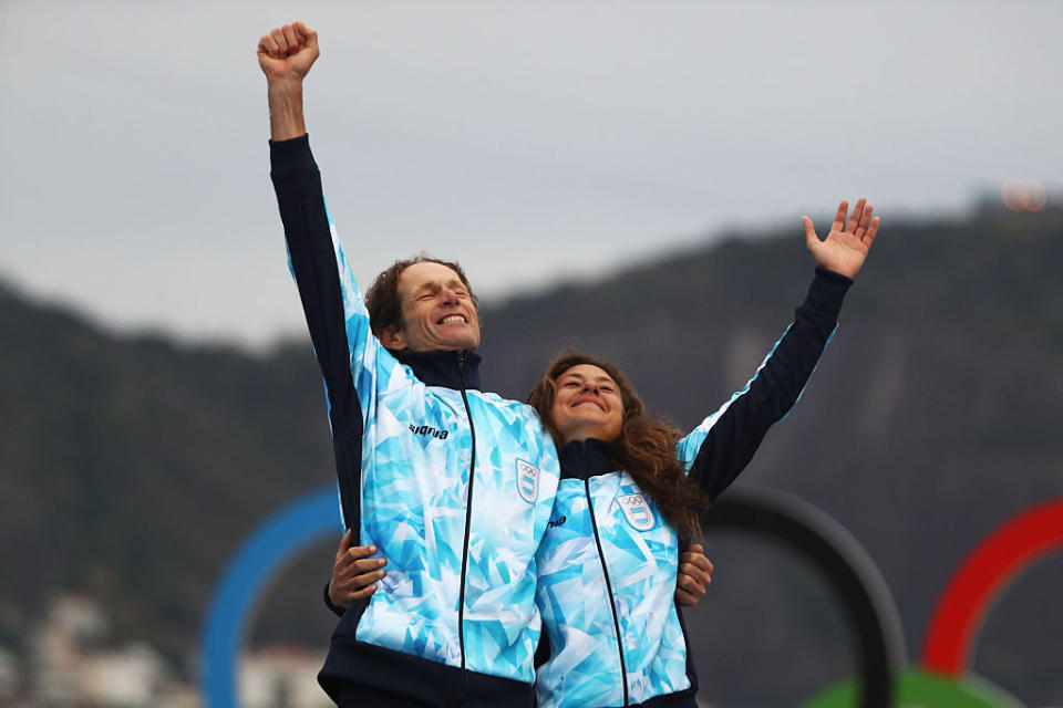 54-year-old Argentinean sailor Santiago Lange celebrates with his sailing partner Cecilia Carranza Saroli. (Getty)