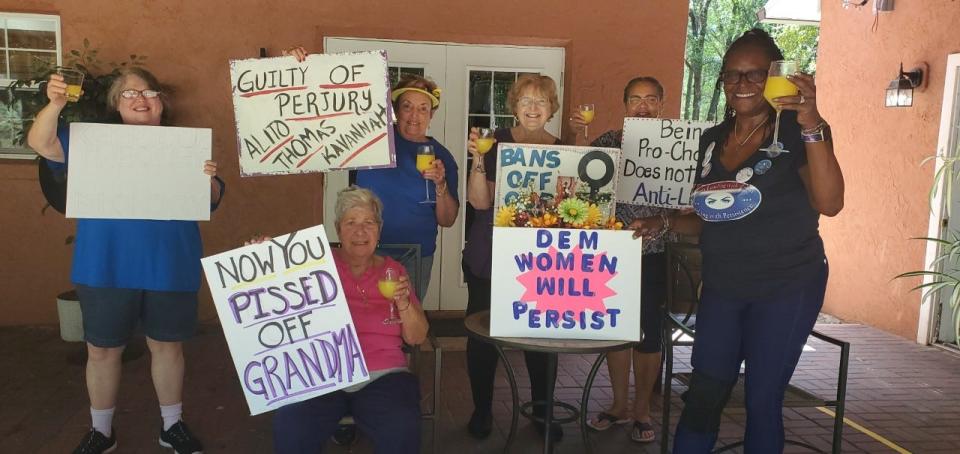 Some of the women planning a pro-choice march in Port Orange on Saturday meet Wednesday to make signs opposing the Supreme Court's proposed opinion overturning the 1973 Roe v. Wade decision legalizing abortion in the United States. From left, Jodi Gustafson, Judith Southard, Barbara Grimm, Cindy Kwalwasser, Debra Williams and Alyce Shelton.