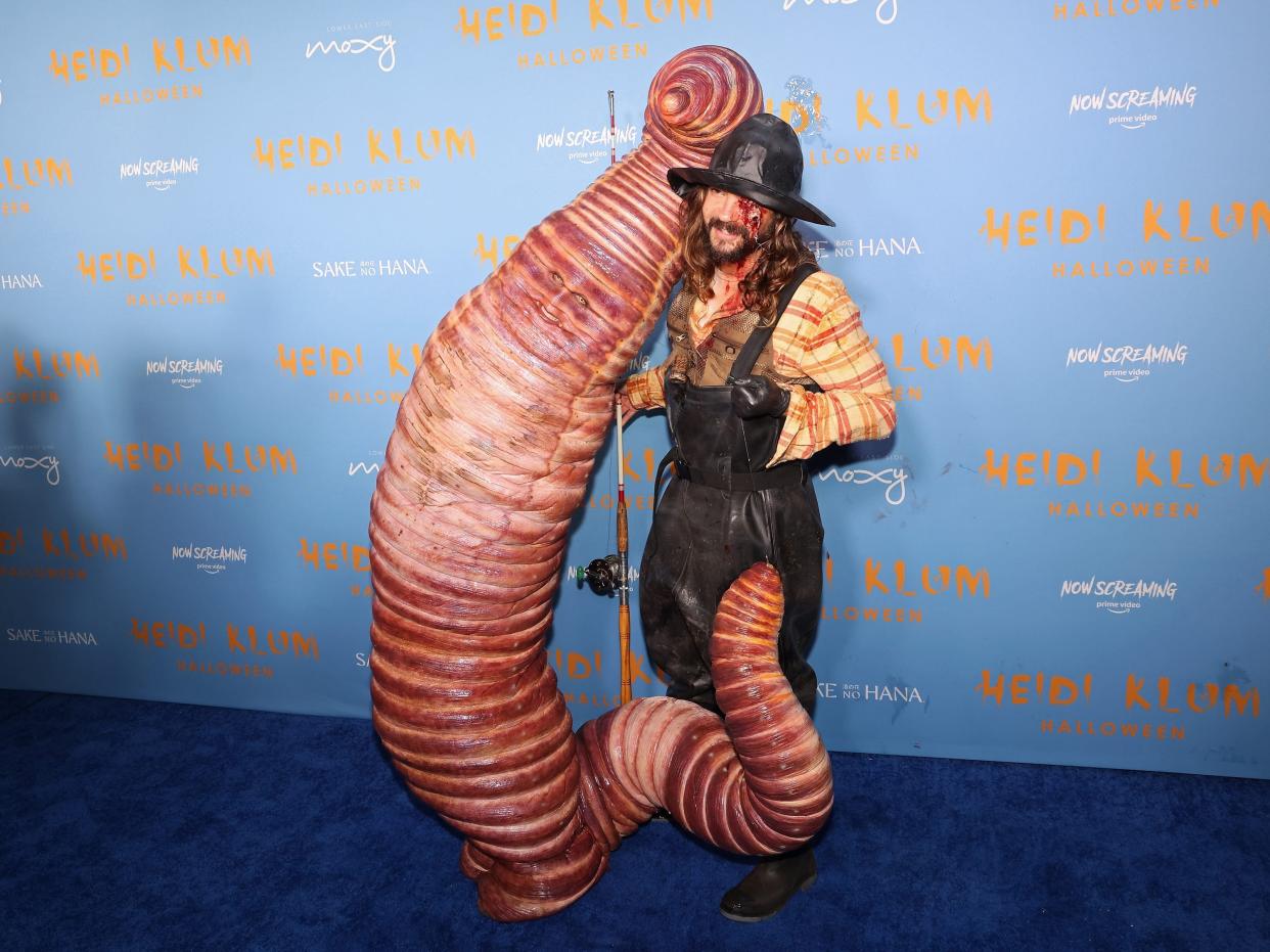 Heidi Klum dressed like a worm and Tom Kaulitz dressed like a fisherman