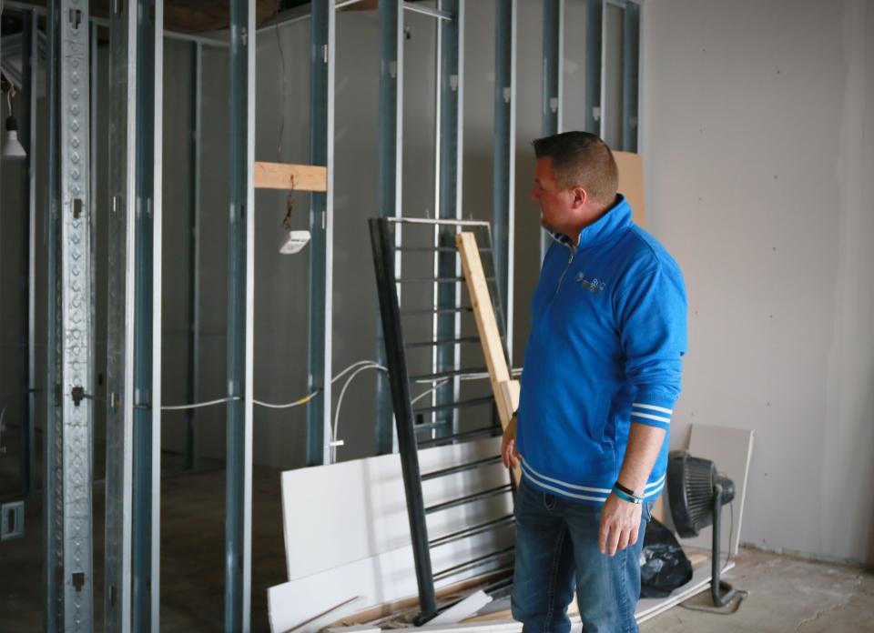 Executive Director Patrick Patterson walks through one of the rooms slated to be renovated using federal COVID stimulus funding at the Blue Water Recovery and Outreach Center on Wednesday, Feb. 9, 2022.