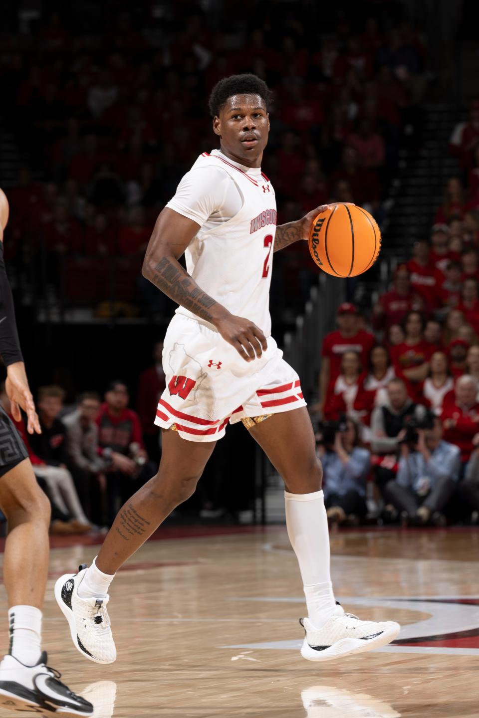 Wisconsin sophomore guard AJ Storr, who lived in Rockford until moving to Kankakee as a sophomore in high school, dribbles the ball during a Big Ten Conference men’s basketball game against the Michigan State Spartans, Friday, Jan. 26, 2024, in Madison, Wis.