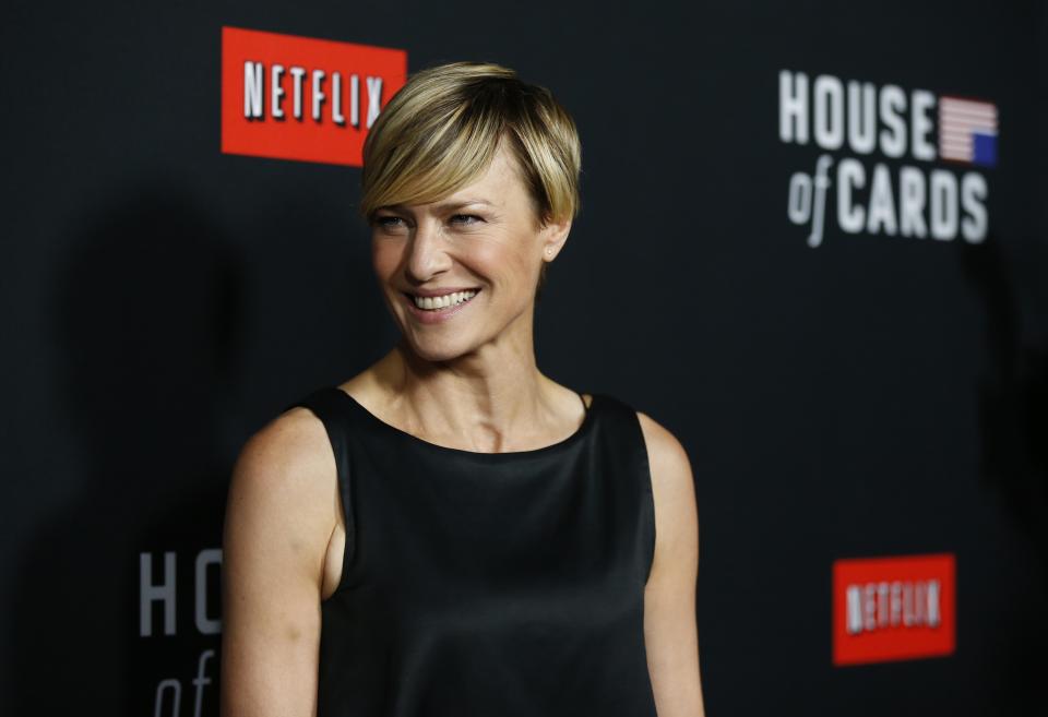 Cast member Wright poses at the premiere for the second season of the television series "House of Cards" at the Directors Guild of America in Los Angeles