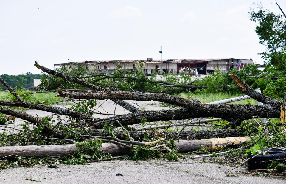 Houses, businesses and vehicles in Trotwood were damage by tornadoes late Monday night, May 27. Many streets were blocked for downed trees, power lines and debris scattered through the neighborhoods. This is a view of the old Hara Arena from Basore Road. WHIO File