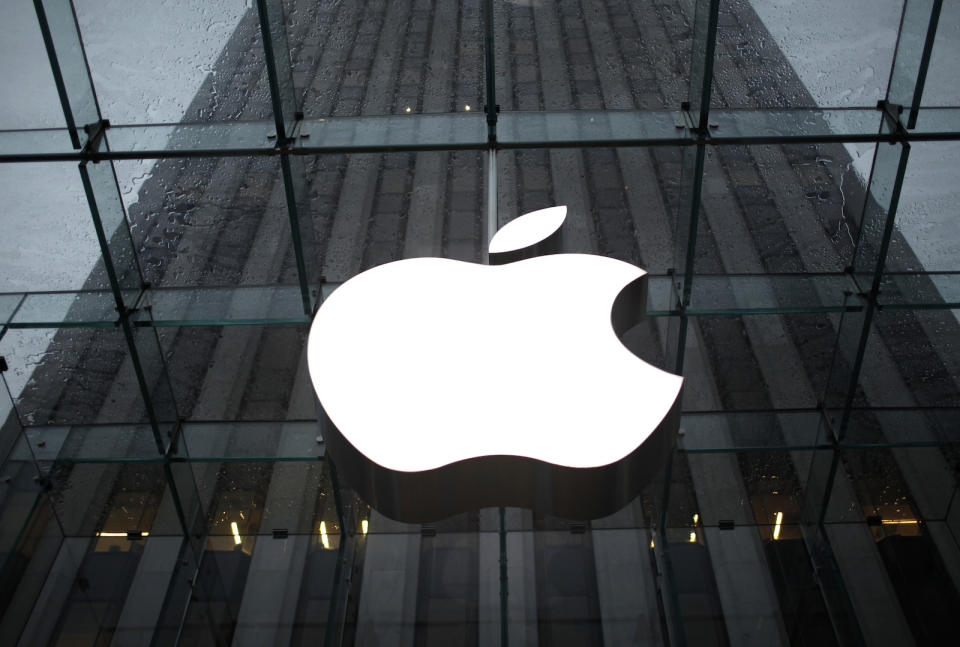 The Apple Inc. logo is seen in the lobby of New York City's flagship Apple store January 18, 2011. The health of Apple Chief Executive Steve Jobs was set to overshadow quarterly sales numbers on Tuesday from the consumer electronics powerhouse whose iPhone and iPad excited holiday shoppers. REUTERS/Mike Segar   (UNITED STATES - Tags: BUSINESS SCI TECH) - GM1E71I1R7H01